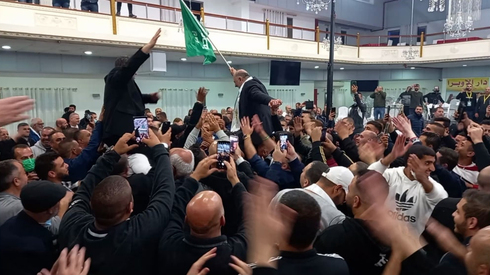 Ra'am supporters celebrate election results that put the party in the Knesset