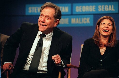 Costars 'Just Shoot Me' George Segal, left, and Laura San-Giacomo on a news tour in California, January 1997 