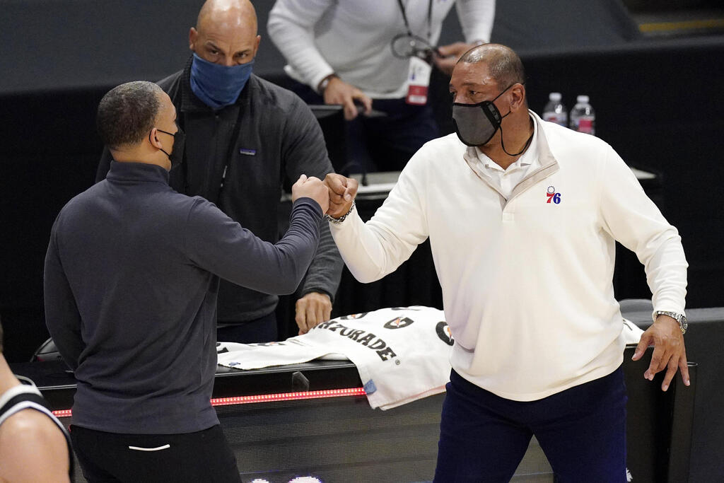 Doc Rivers and Tyrone Lou