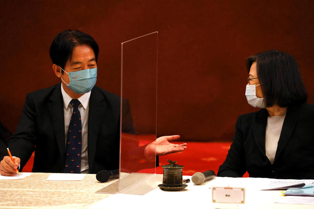 Taiwan President Tsai Ing-wen and Vice President William Lai attend a news conference