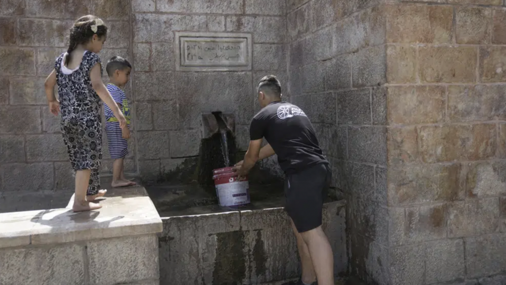 A Palestinian collects water from a spring in the West Bank village of Battir Sunday, June 4, 2023 (Photo: AP / Mahmoud Illean) A Palestinian collects water from a spring in the West Bank village of Battir Sunday, June 4, 2023