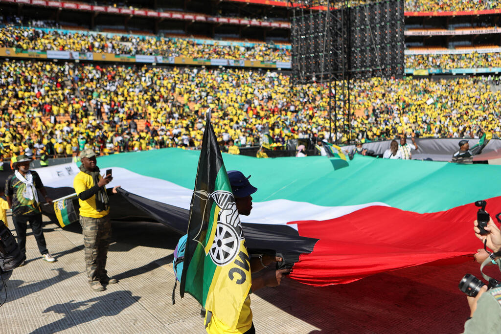 דרום אפריקה בחירות עצרת של מפלגת הקונגרס הלאומי האפריקני ANC דגל פלסטין