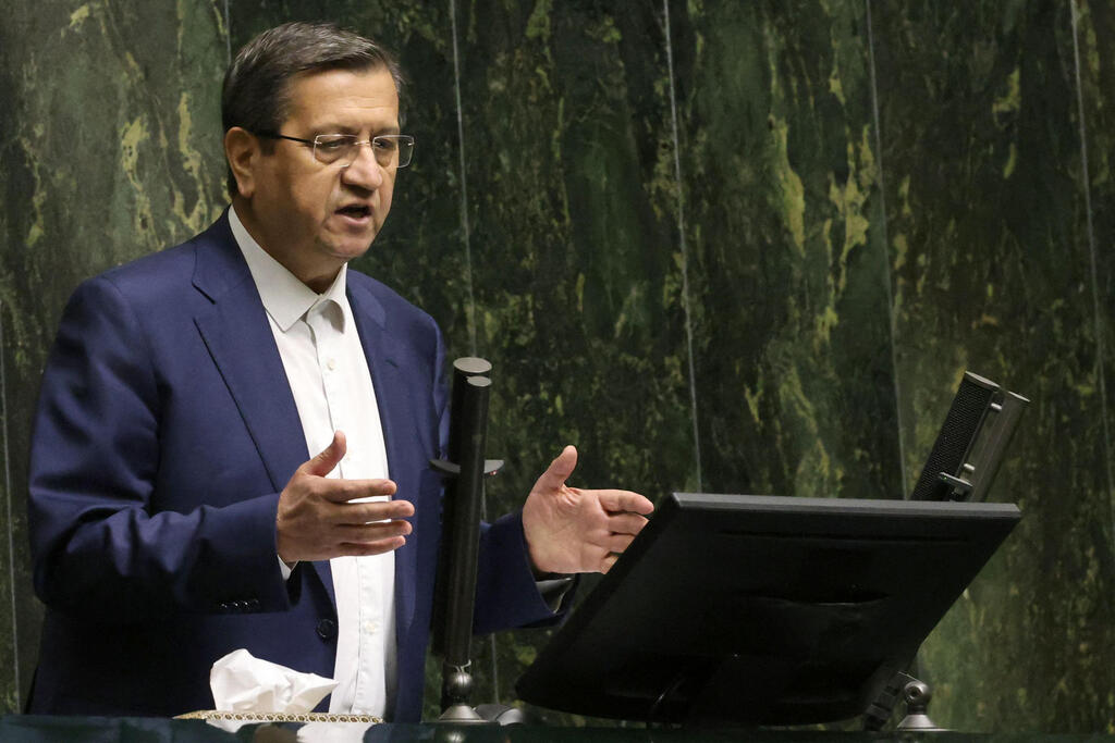 Iran's Finance Minister Abdolnaser Hemmati delivers a speech to members of parliament in Tehran on March 2, 2025, during impeachment proceedings against him 