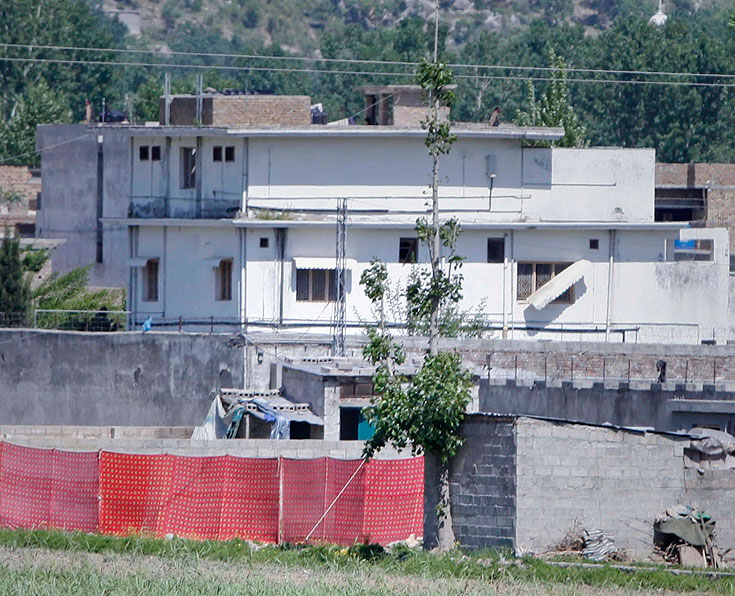 הבית מוקף החומה באבוטבאד, שם נתפס אוסמה בן לאדן. לא תופס שום תשומת לב (צילום: רויטרס)