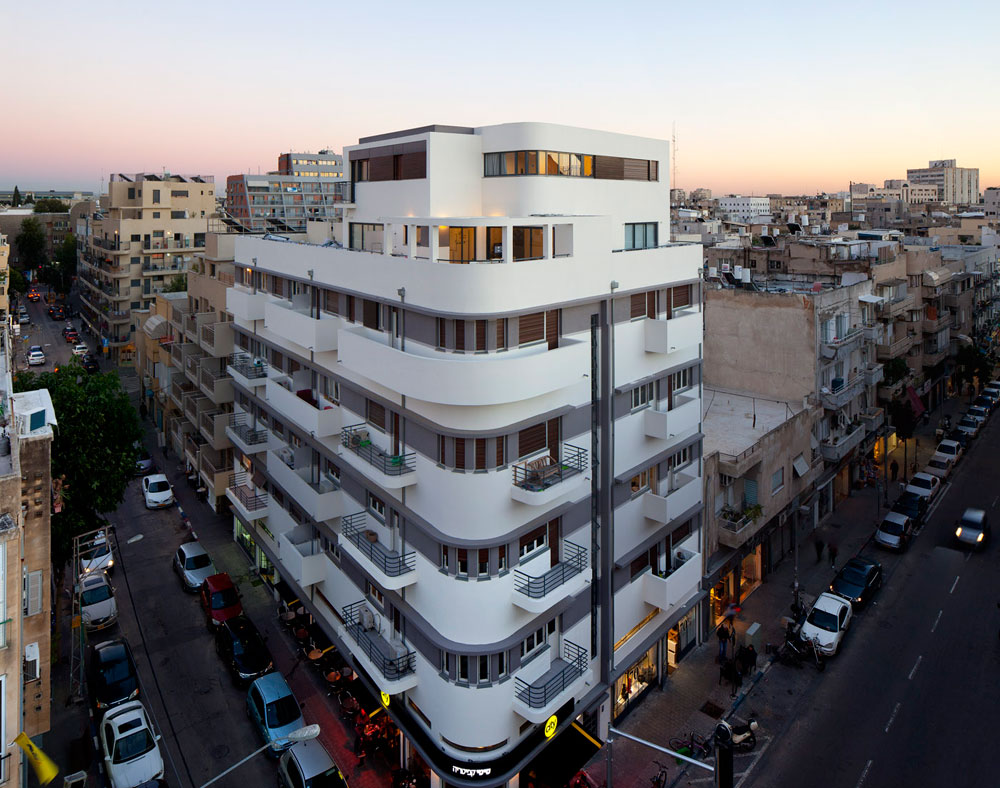 הבניין המקורי כלל ארבע קומות: קומת קרקע מסחרית ושלוש קומות מגורים. נוספו להן שלוש קומות עליונות: אחת ברוח הבניין המקורי, והאחרות בנסיגה של שני מטרים וחצי מקו החזית הרצל פלורנטין בניין לשימור עמיר פלג עדי גל